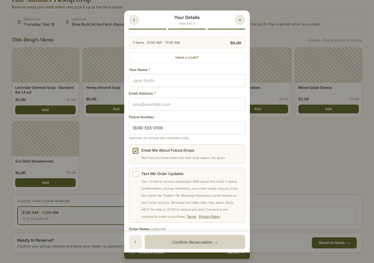 The Traders Till checkout Details step, showing the optional phone number field and the unchecked Text Me Order Updates consent checkbox with its full disclosure text